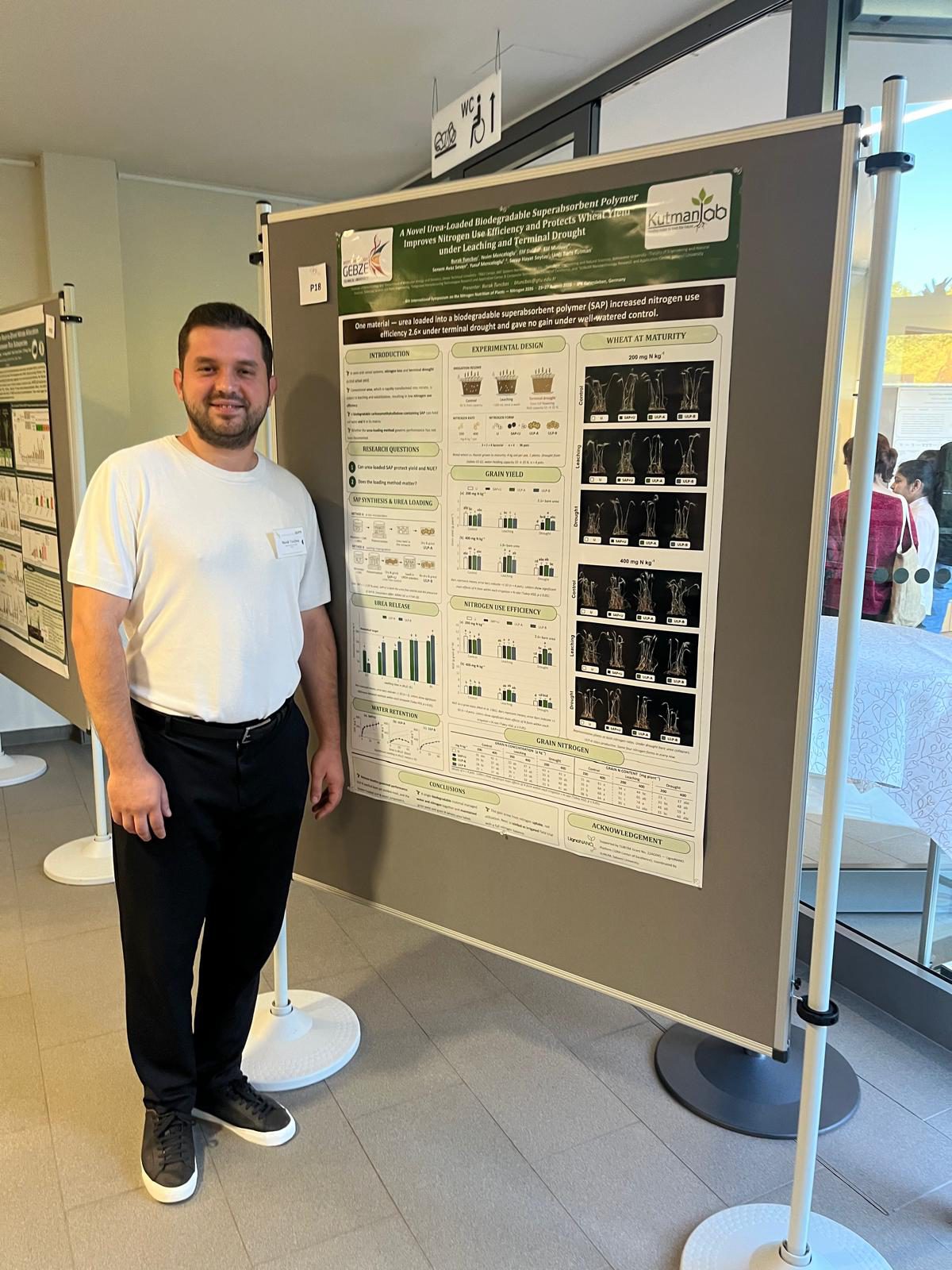 Burak Tunçbaş at his poster